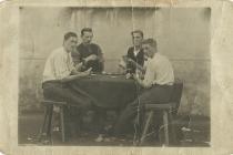 Postcard of Herbert Blake and three other POWs