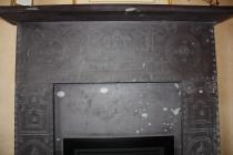Decorated slate fireplace