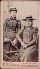 Photograph of two girls in their Sunday best