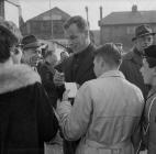 John Charles giving autographs