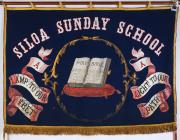 Baner gyda'r teitl 'Siloa Sunday School'