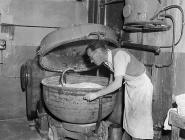 Making Eccles cakes at the Arran factory in...