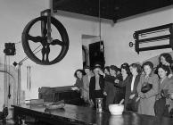 Visitors in the kitchen of St. Fagans Castle,...