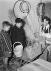 Basket weaver at work at the Welsh Folk Museum,...