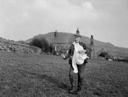 A farmer sowing seeds in the traditional manner...