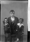 Ventriloquist and his dolls, c. 1885