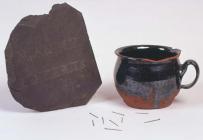 Cursing pot and slate inscription, 19th century