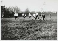 Hockey match on fields next to Roman Catholic...