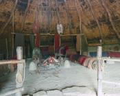 Interior of a reconstructed roundhouse at...