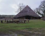 View of outside of reconstructed roundhouse at...