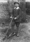 Boy with scooter, Crickhowell, c. 1905