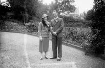 Photograph of a couple in a driveway, 1934,...