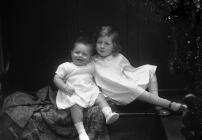 Portrait photograph of two young children,...