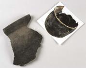 A fragment of a mediaeval fireless cooking pot,...