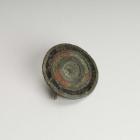 Enamelled plate brooch from the Roman period