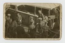 Stretcher cases going on board hospital ship,...