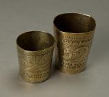 Two brass goblets from Mesopotamia, where John...