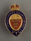 Caernarvonshire Volunteer Regiment lapel badge...