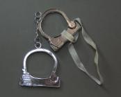 Metallic handcuffs lucky charm