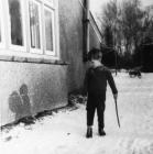 Boy playing in the snow