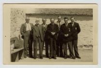 Men chatting on Ysbyty Ystwyth square after...