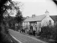 family group in front of house (Evans)