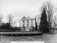 Morris family in front of their house