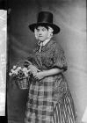 woman in national dress with a basket of flowers