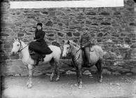 girl and a boy riding ponies (Williams)