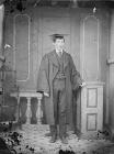 youn man in academic dress