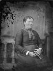 woman sitting and holding a book