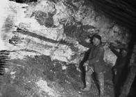 Miners underground at Pumsaint gold mine