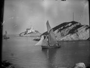 Sailing boats, with Mumbles lighthouse at...