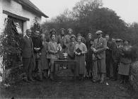 Group of people with a golfing trophy