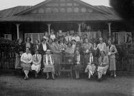 Group of women golfers with trophies outside...