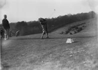 Man driving off from a tee