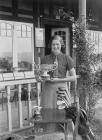 Lady holding a trophy outside Llandrindod Wells...