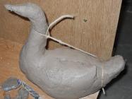Creating Sarasvati's swan from clay