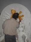 Painting the sculpture of the Goddess Durga