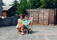 Mother and daughter in the back garden