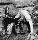 A young boy working underground, Rhondda, about...