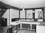 Early 1970s fitted kitchen at Bryndraenog,...