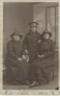 Three ticket conductors in official uniform for...