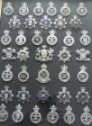 Former police forces of Wales cap badges.