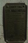 Plaque to Luis Jorge Fontana with a list of the...