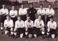 Photograph of team, September 1953