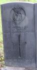 The gravestone of John Thomas at Glanadda Cemetery