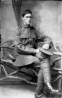 Soldier, Welsh Regiment, seated