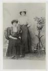 Studio portrait of two ladies.