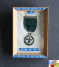Framed medal of merit for Roland Exton Reynolds...